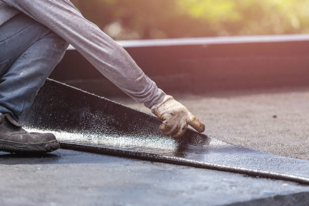 Professional Basement Waterproofing technician working in Darien, WI